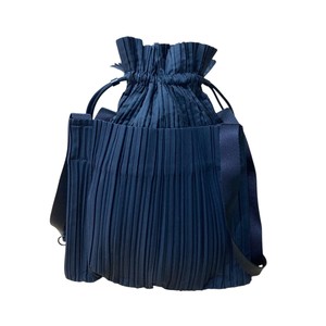 PLEATS PLEASE